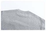 DAXUEN black oversized crewneck sweatshirt with metallic zip pocket