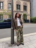 DAXUEN olive green and brown mixed camouflage leopard wide-leg cargo pants — model photo