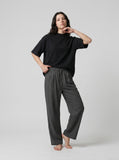 DAXUEN black mock neck oversized cotton tee — model photo