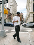 DAXUEN black mock neck oversized cotton tee — model photo