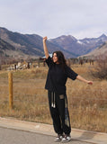DAXUEN black mock neck oversized cotton tee — model photo