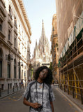 DAXUEN Oversized V-neck T-shirt with money print — model photo