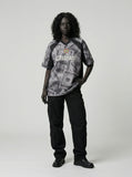 DAXUEN Oversized V-neck T-shirt with money print — model photo
