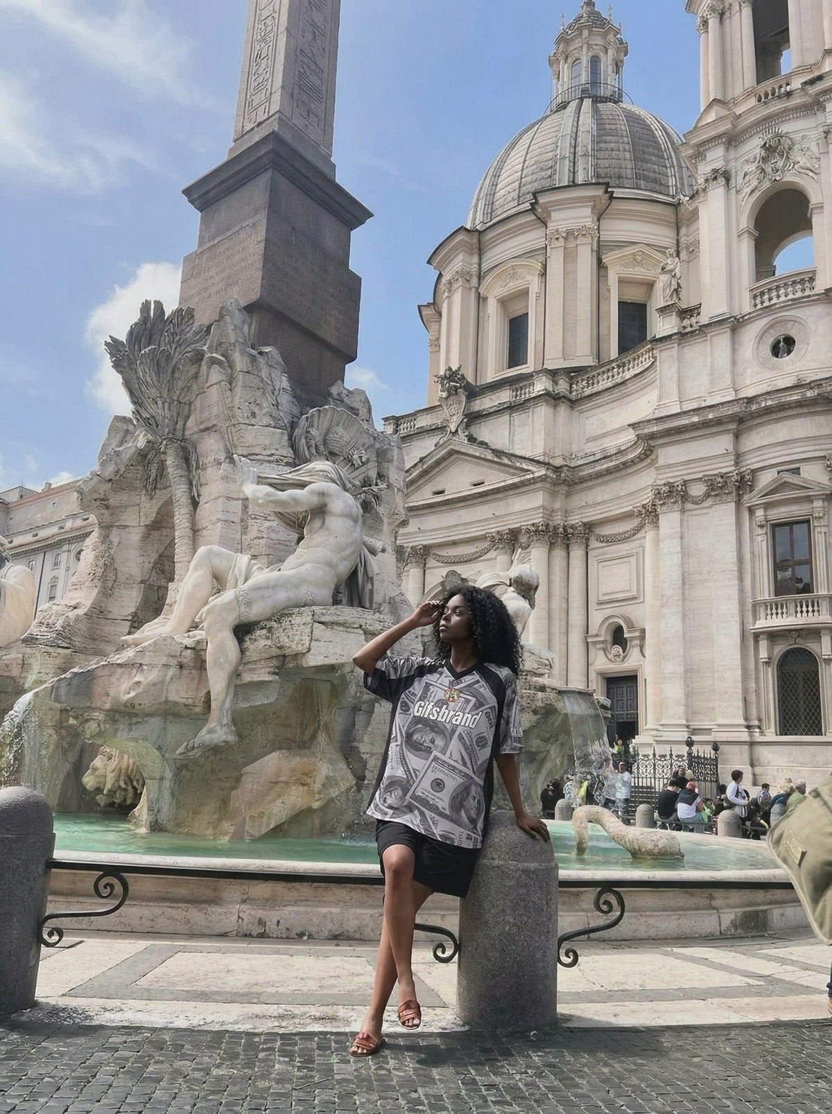 DAXUEN Oversized V-neck T-shirt with money print — model photo