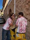 DAXUEN Oversized V-neck T-shirt with money print — model photo