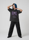 DAXUEN black oversized monochrome desk graphic tee — model photo
