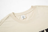 DAXUEN beige sleeveless woman's face graphic tee