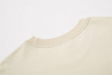 DAXUEN beige sleeveless woman's face graphic tee