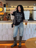 DAXUEN Oversized short-sleeved t-shirt with distressed text print — model photo