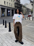 DAXUEN white oversized multi-color fish and starfish graphic t-shirt — model photo