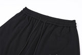 DAXUEN black oversized multi-graphic knit sweatpants