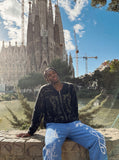 DAXUEN black oversized multi-graphic knit sweatpants — model photo