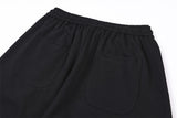 DAXUEN black oversized multi-graphic knit sweatpants