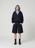DAXUEN dark indigo multi-layered denim wide-leg shorts — model photo