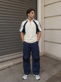 DAXUEN charcoal grey cargo pants with multiple pockets — model photo