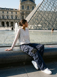 DAXUEN charcoal grey cargo pants with multiple pockets — model photo