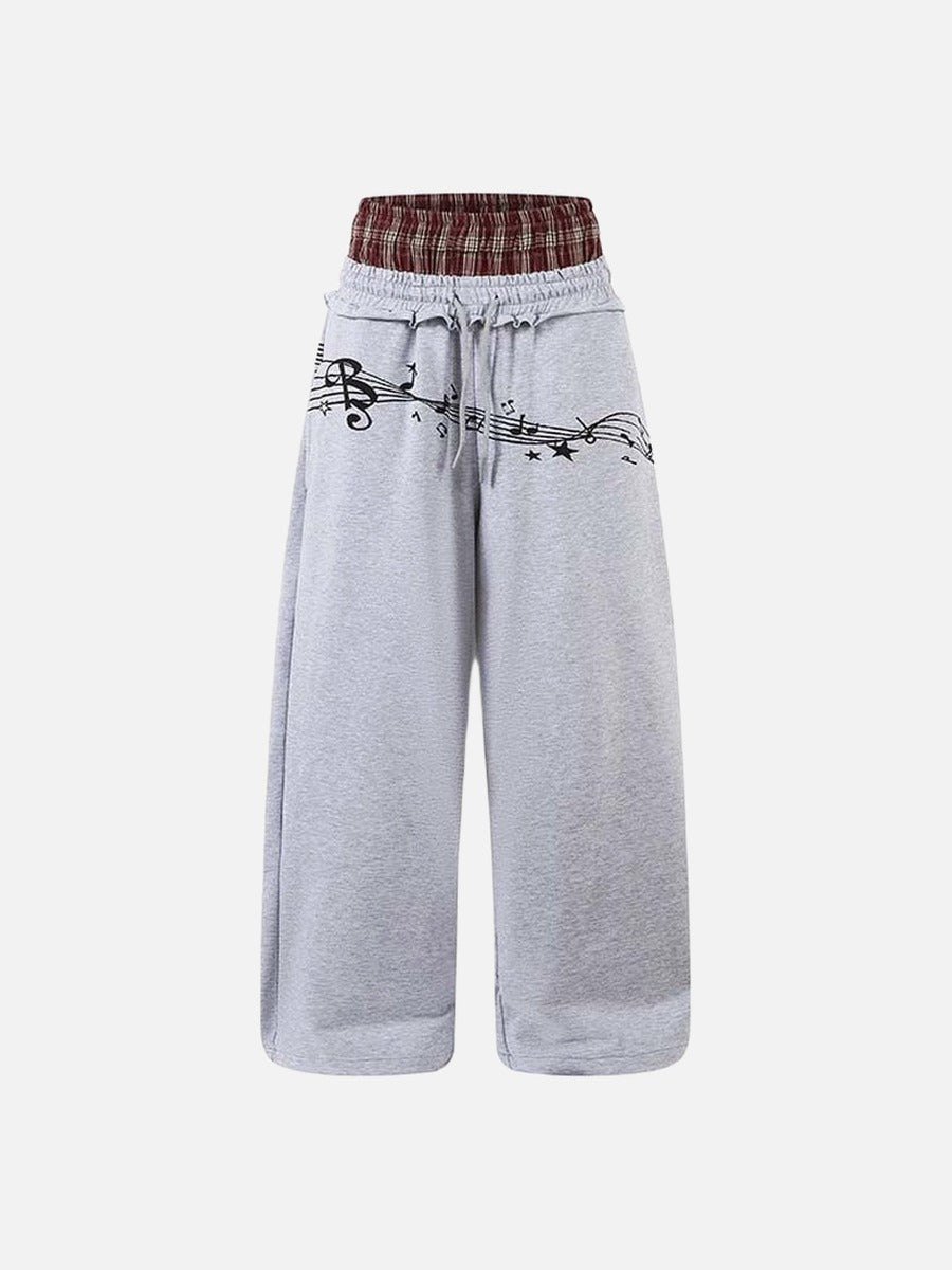DAXUEN Grey wide-leg sweatpants with musical print and plaid details