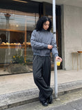 DAXUEN muted grey-blue sculptural bomber jacket — model photo