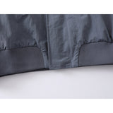 DAXUEN muted grey-blue sculptural bomber jacket