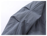 DAXUEN muted grey-blue sculptural bomber jacket