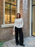 DAXUEN white muted portrait graphic long-sleeve Henley T-shirt — model photo