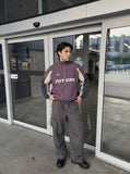 DAXUEN muted purple color-blocked track jacket — model photo