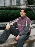 DAXUEN muted purple color-blocked track jacket — model photo