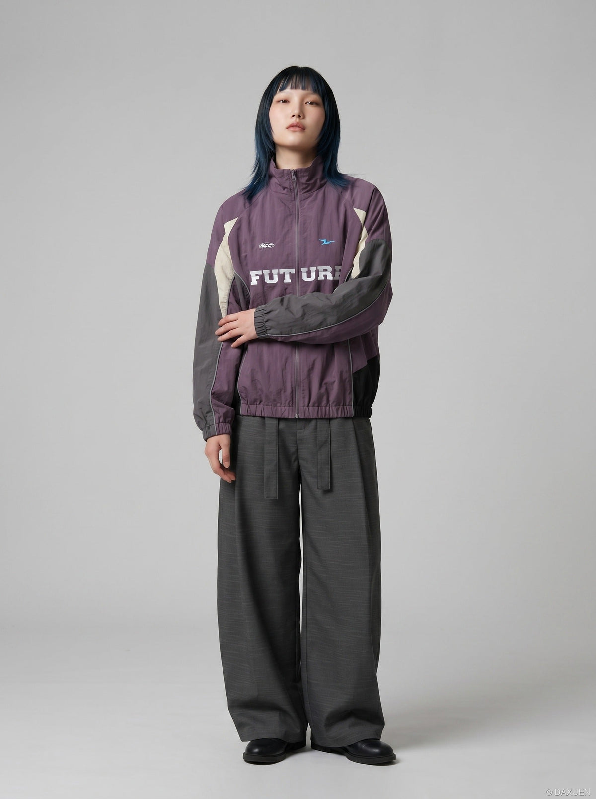 DAXUEN muted purple color-blocked track jacket — model photo