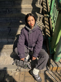 DAXUEN dark muted purple padded parka jacket with grey faux fur lining — model photo