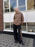 DAXUEN muted blue-grey striped long-sleeve top — model photo