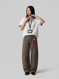 DAXUEN Cat embroidered polo shirt with striped collar — model photo