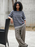 DAXUEN Navy and grey striped relaxed-fit Henley t-shirt — model photo