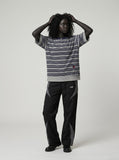 DAXUEN Navy and grey striped relaxed-fit Henley t-shirt — model photo