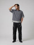 DAXUEN Navy and grey striped relaxed-fit Henley t-shirt — model photo