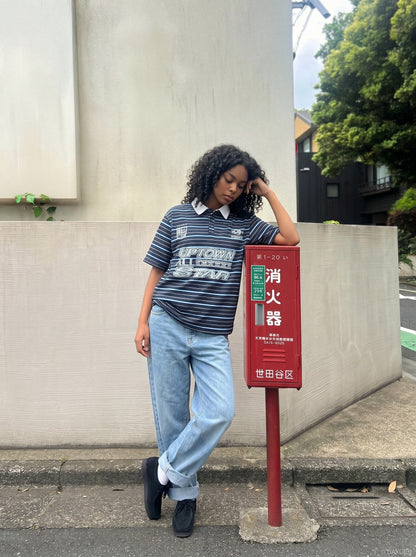 DAXUEN Navy and light blue striped polo shirt — model photo