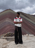 DAXUEN white open-knit polo with navy and red accents — model photo
