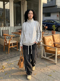 DAXUEN navy blue fleece zip jacket with yellow stripes — model photo