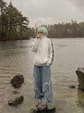 DAXUEN navy blue fleece zip jacket with yellow stripes — model photo
