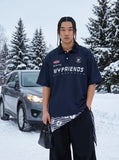 DAXUEN Navy oversized polo shirt with graphics — model photo