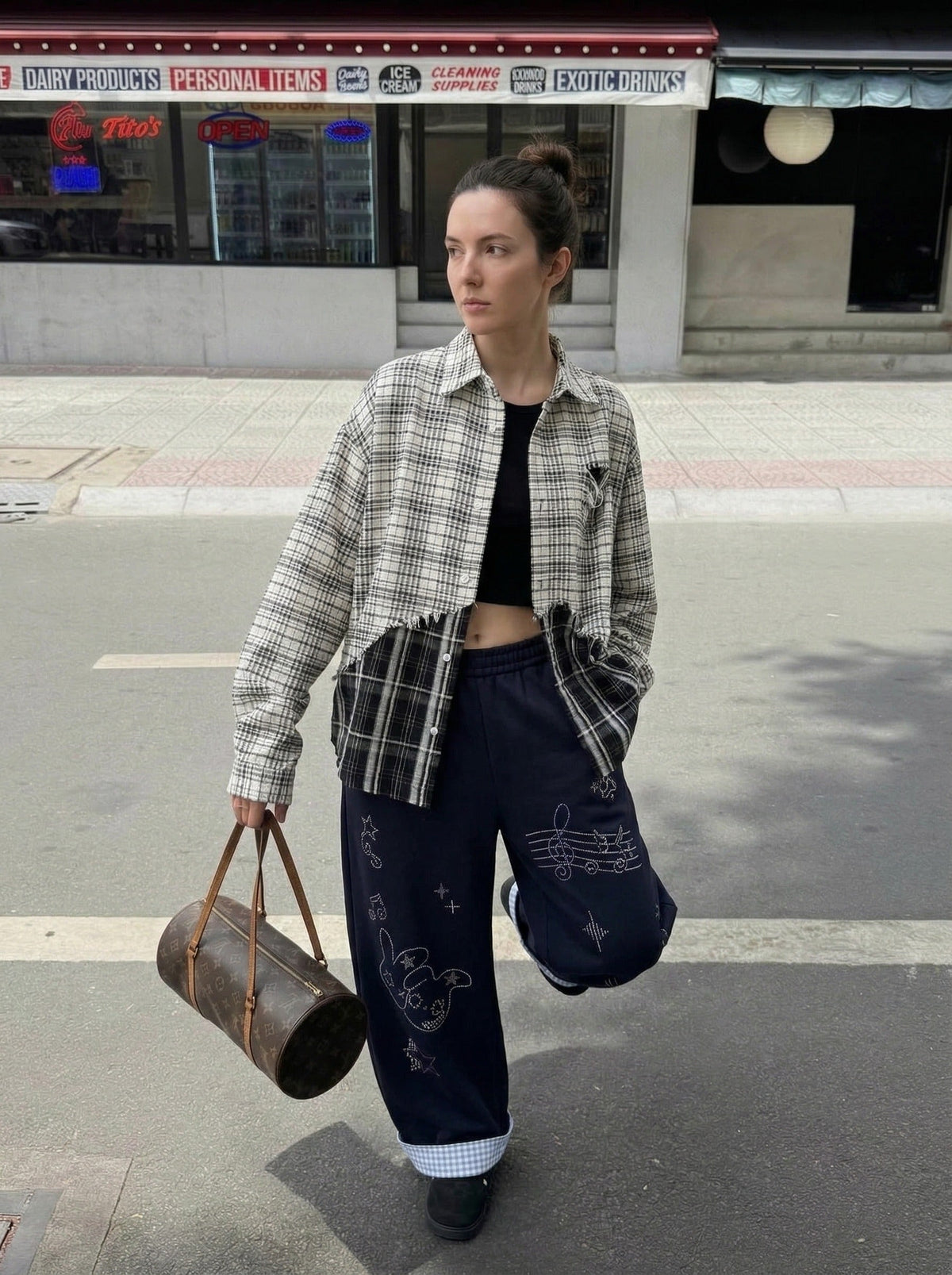 DAXUEN Navy wide-leg sweatpants with embroidered graphics — model photo