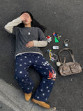 DAXUEN Navy Wide-Leg Sweatpants with Skyline Graphic | DAXUEN — model photo