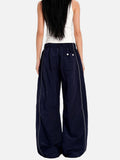 DAXUEN dark navy wide-leg trousers with gold stripes