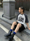 DAXUEN Oversized raglan sleeve t-shirt with graphic print — model photo