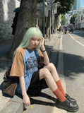 DAXUEN Oversized raglan sleeve t-shirt with graphic print — model photo