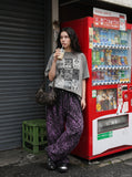 DAXUEN faded grey nine-panel newsprint graphic tee — model photo