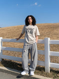 DAXUEN Oversized short-sleeved t-shirt with graphic print — model photo