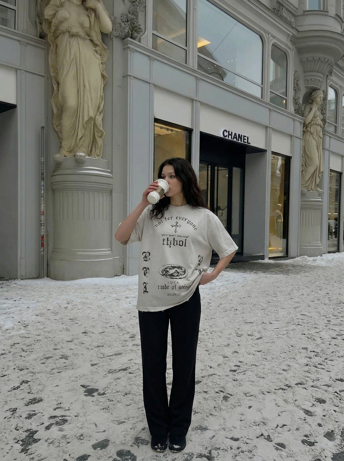 DAXUEN Distressed oversized crew-neck t-shirt with graphic prints — model photo