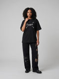 DAXUEN Graphic t-shirt with numbers and pins design — model photo