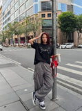 DAXUEN Graphic t-shirt with numbers and pins design — model photo