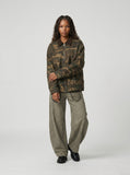 DAXUEN olive green camouflage utility jacket — model photo